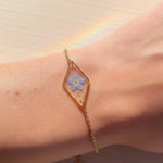 Braccialetto terrarium fiore vero forget me not azzurro Ciondolo resina catenella acciaio regolabile taglia unica.Gioielli resina fiori