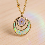 Forget me not real flower necklace and UV resin opal flakes. 18k gold plated Circles pendant.Resin jewelry.Forget-me-not pressed flowers