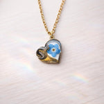 Braccialetto memoriale cuore cane. fiore vero nontiscordardime resina. Gioiello acciaio regolabile taglia unica.Idea regalo amante cani