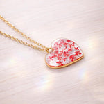 Woman heart pendant necklace with real red flowers in resin. Steel chain. Minimalist jewelry botany terrarium nature