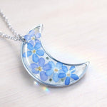 Collana Luna fiori veri Forget me not in resina uv. Ciondolo Luna argento nontiscordardimé .Gioielli resina.Fiori pressati essiccati