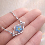 Braccialetto terrarium fiore vero forget me not azzurro Ciondolo resina catenella acciaio regolabile taglia unica.Gioielli resina fiori