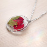Woman necklace with real flower pendant Red rose bud in resin. Gold steel chain Jewels crystals dried flowers pressed terrarium