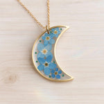 Collana Luna fiori veri Forget me not in resina uv. Ciondolo Luna argento nontiscordardimé .Gioielli resina.Fiori pressati essiccati
