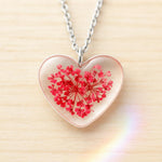 Woman heart pendant necklace with real red flowers in resin. Steel chain. Minimalist jewelry botany terrarium nature