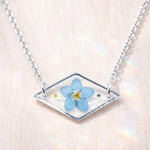 Braccialetto terrarium fiore vero forget me not azzurro Ciondolo resina catenella acciaio regolabile taglia unica.Gioielli resina fiori