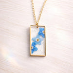 Real flowers heart necklace Forget me not in uv resin. Silver forget-me-not heart pendant. Resin jewelry. Dried pressed flowers