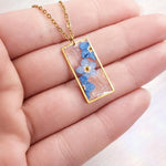 Real flowers heart necklace Forget me not in uv resin. Silver forget-me-not heart pendant. Resin jewelry. Dried pressed flowers