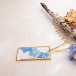 Real flowers heart necklace Forget me not in uv resin. Silver forget-me-not heart pendant. Resin jewelry. Dried pressed flowers