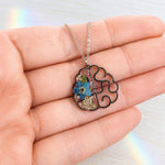 Handmade necklace with anatomical brain pendant in steel and real flowers.Resin jewelry.Gift for doctors.Gift for psychologists,neurologists