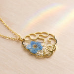 Handmade necklace with anatomical brain pendant in steel and real flowers.Resin jewelry.Gift for doctors.Gift for psychologists,neurologists