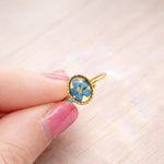 Anello midi nontiscordardime ovale con fiore vero in resina, regolabile in acciaio oro o argento