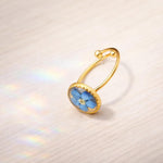 Anello midi nontiscordardime ovale con fiore vero in resina, regolabile in acciaio oro o argento
